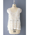 A stylish layered item: knitted lace vest