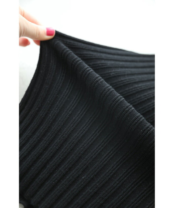 Peplum medium dress with a layered vest look