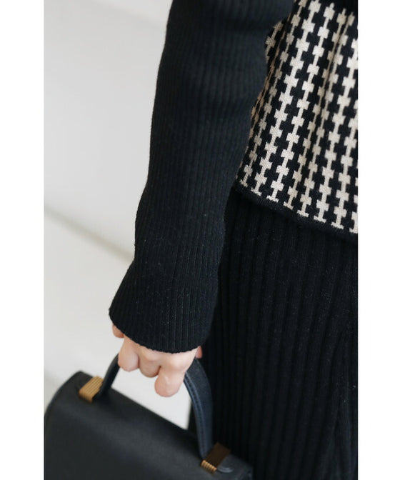 Peplum medium dress with a layered vest look