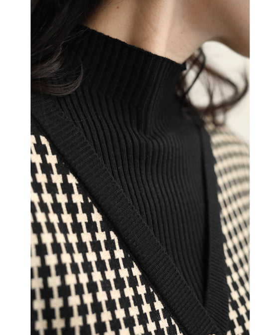 Peplum medium dress with a layered vest look