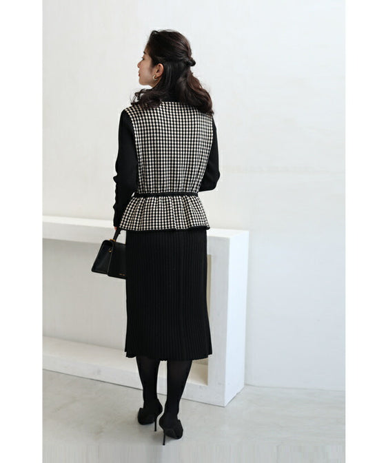 Peplum medium dress with a layered vest look