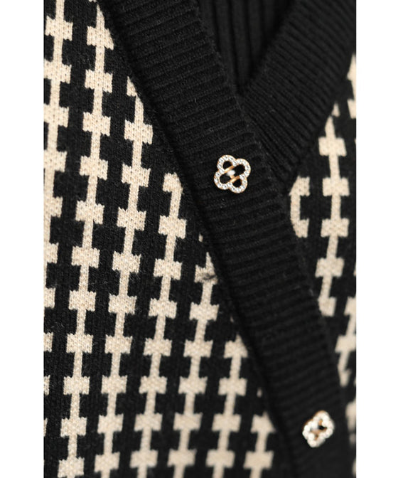 Peplum medium dress with a layered vest look