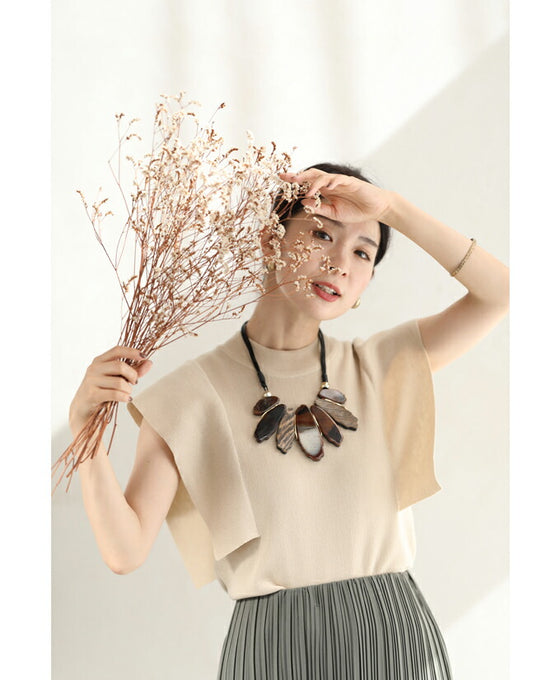 存在感を放つアートなウッド調パーツネックレス