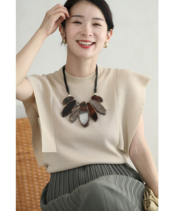 存在感を放つアートなウッド調パーツネックレス