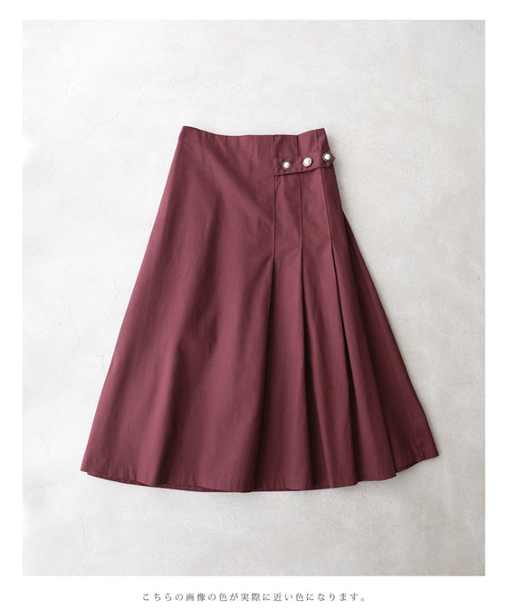 パールボタン連なるアシンメトリープリーツミディアムスカート