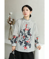 A rose blouse top with an antique feel