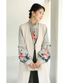 A rose blouse top with an antique feel