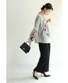 A rose blouse top with an antique feel