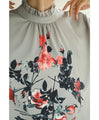 A rose blouse top with an antique feel