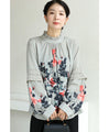 A rose blouse top with an antique feel